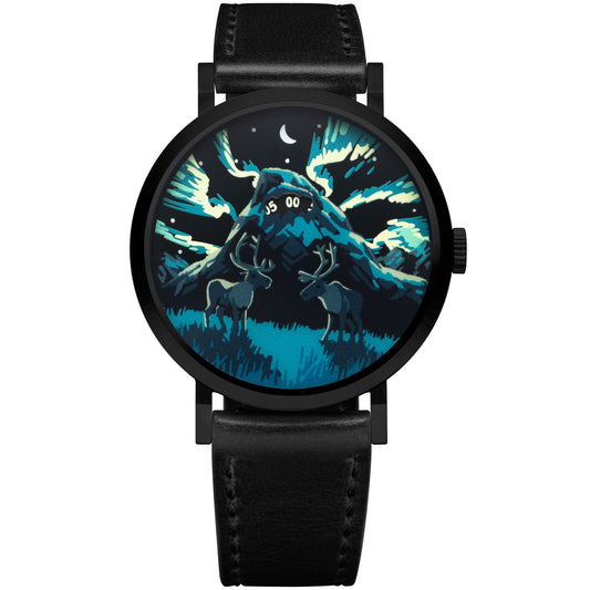 A round analog watch with a black leather strap and a black case, featuring a stylized graphic dial illustration of moose in a mountain landscape at night with blue, teal, and white tones.